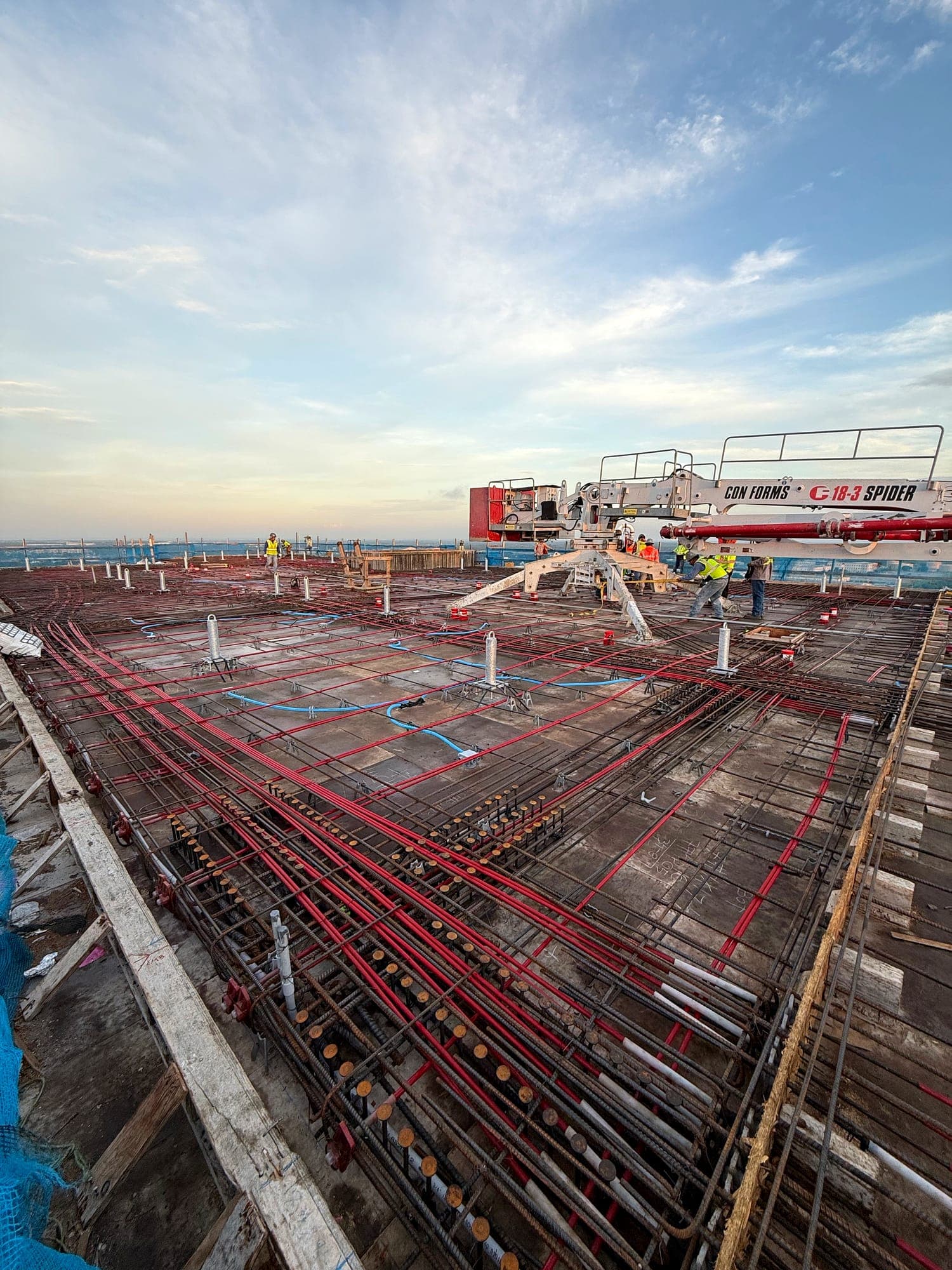 Wide view of reinforcing steel laid out across a structural concrete deck