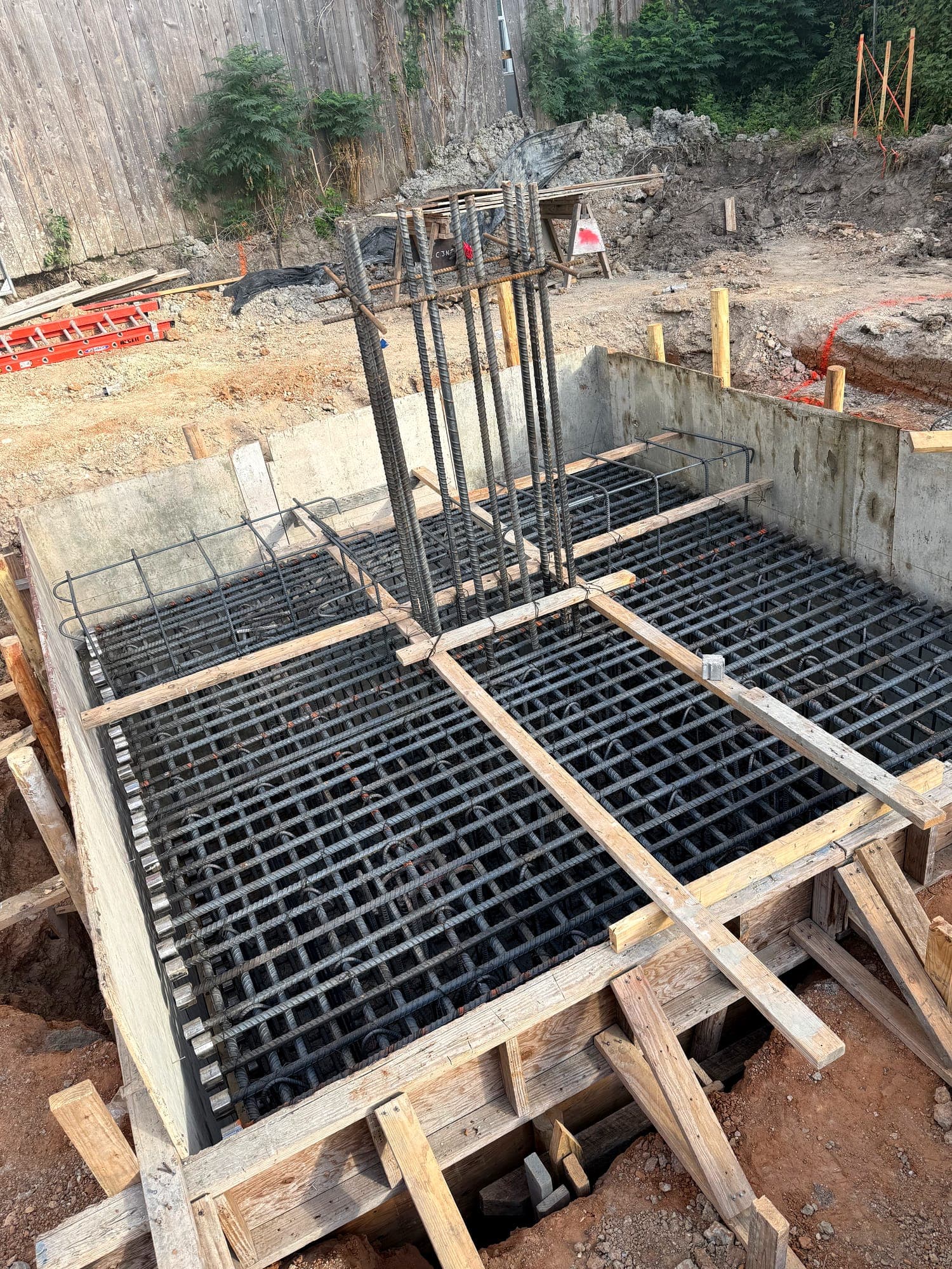Reinforcing cage set in formwork for a grade beam