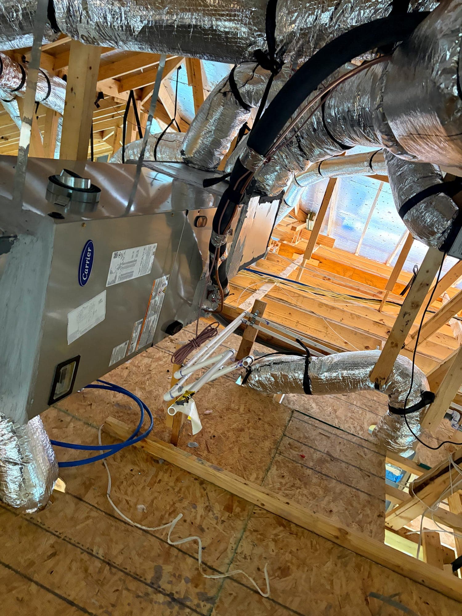 Air handler with flexible duct takeoffs and refrigerant line connections